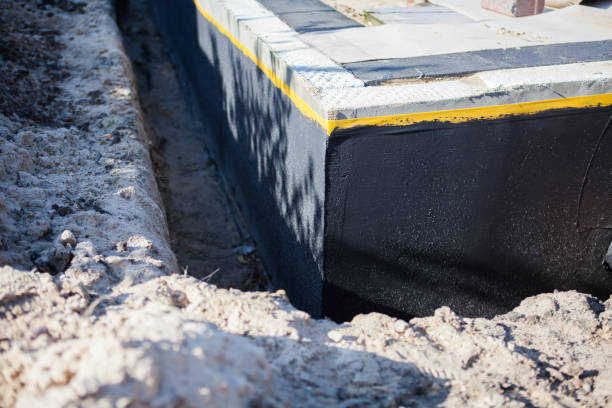 Professional Emergency Waterproofing technician working in Mill Neck, NY